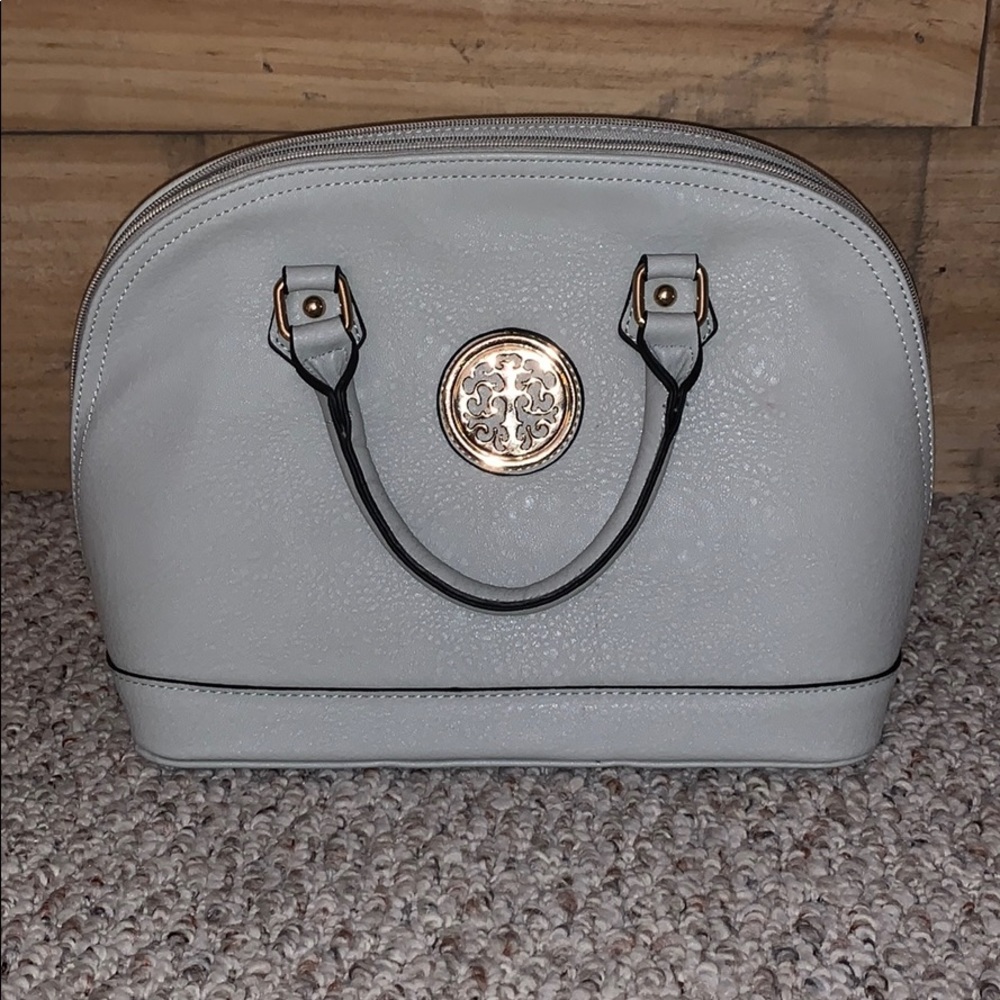Not sure what brand but taupe pocketbook!